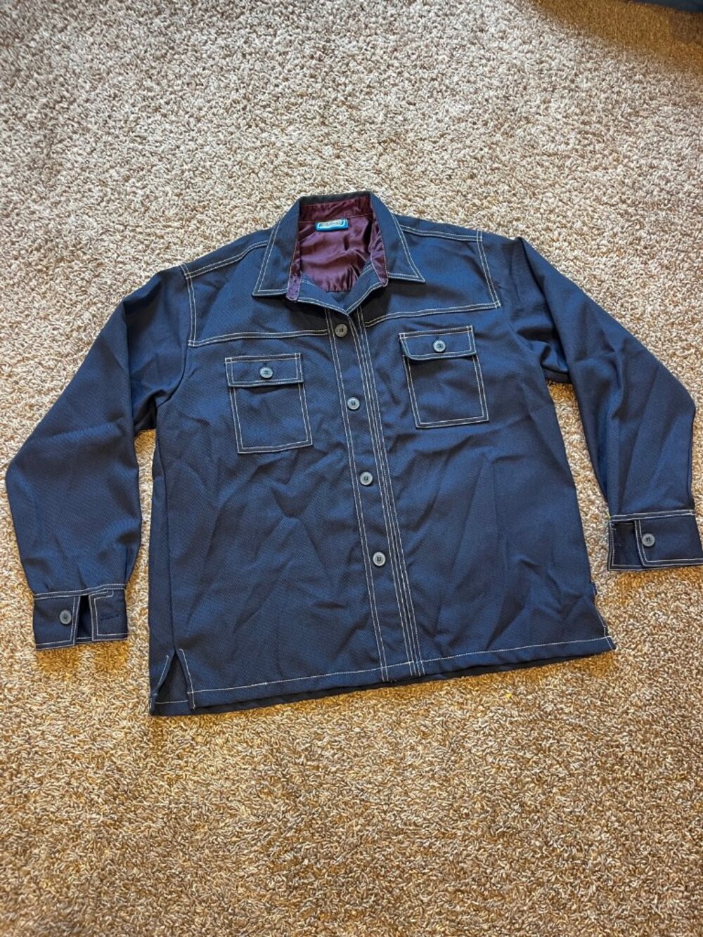 Billabong dark navy button-front jacket with white contrast stitching